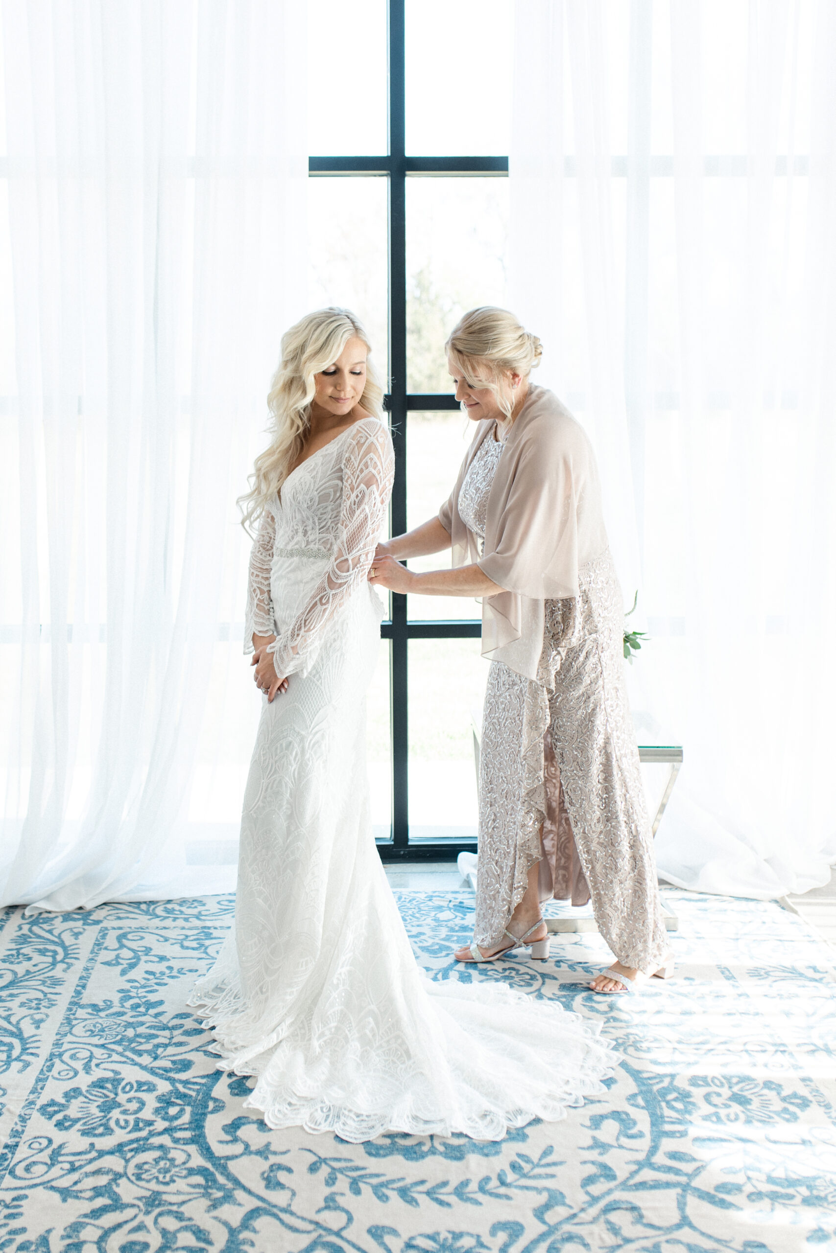 Bride getting ready for her wedding day at The Atrium of Sioux Falls, SD.